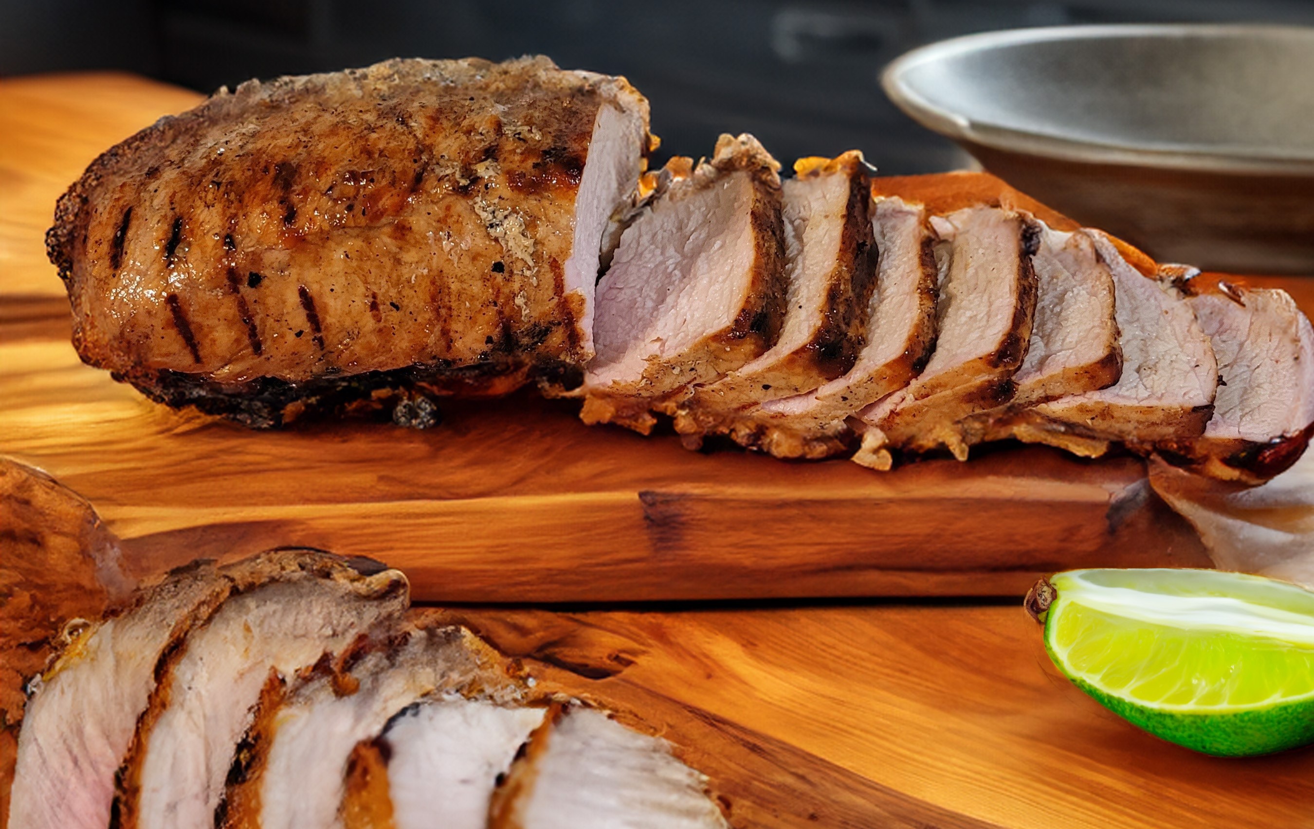 Finished tenderloin with lime, set on a kitchen counter